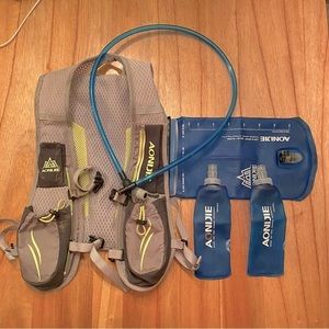 Aonijie Trail Running Hydration Vest. 50oz bladder w/two 8oz handhelds. Used